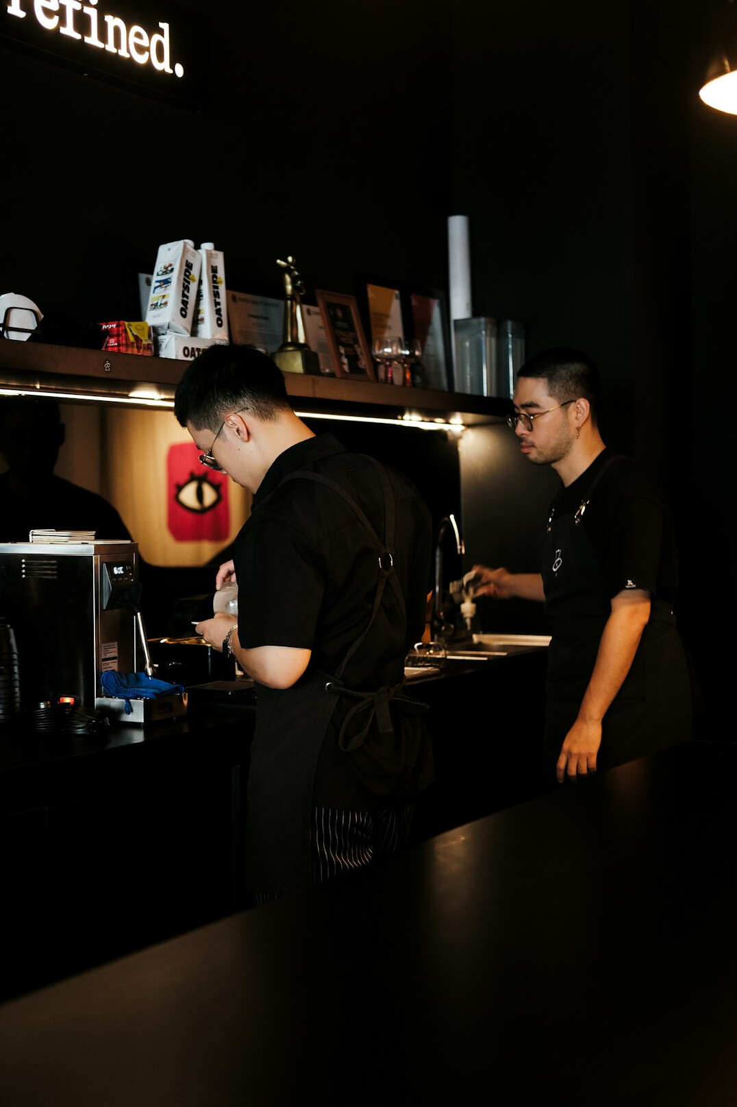 Two professionals talking calmly across a table
